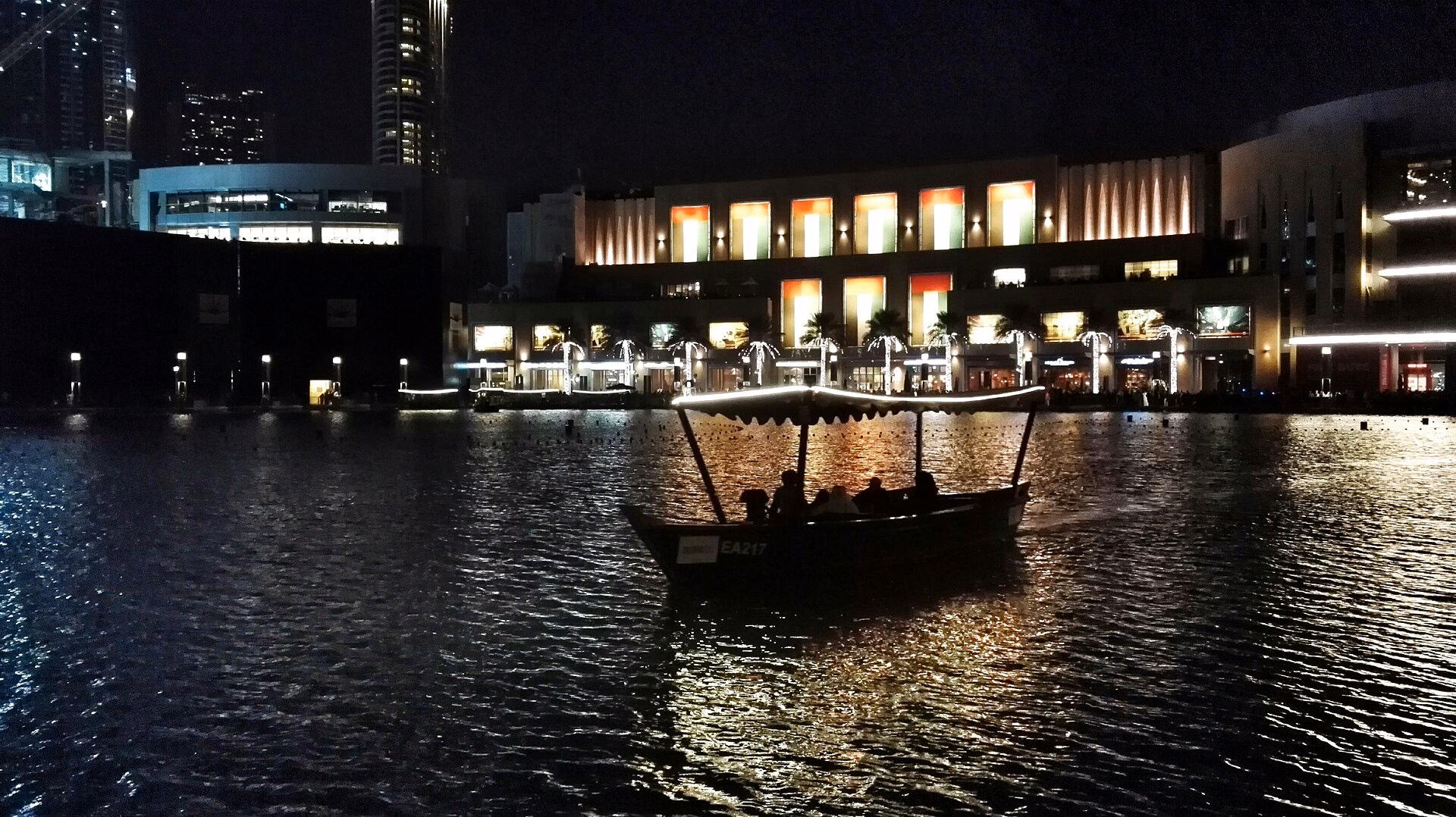 Abra on Burj Khalifa Lake, Dubai Mall behind